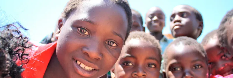 A group of children smiling